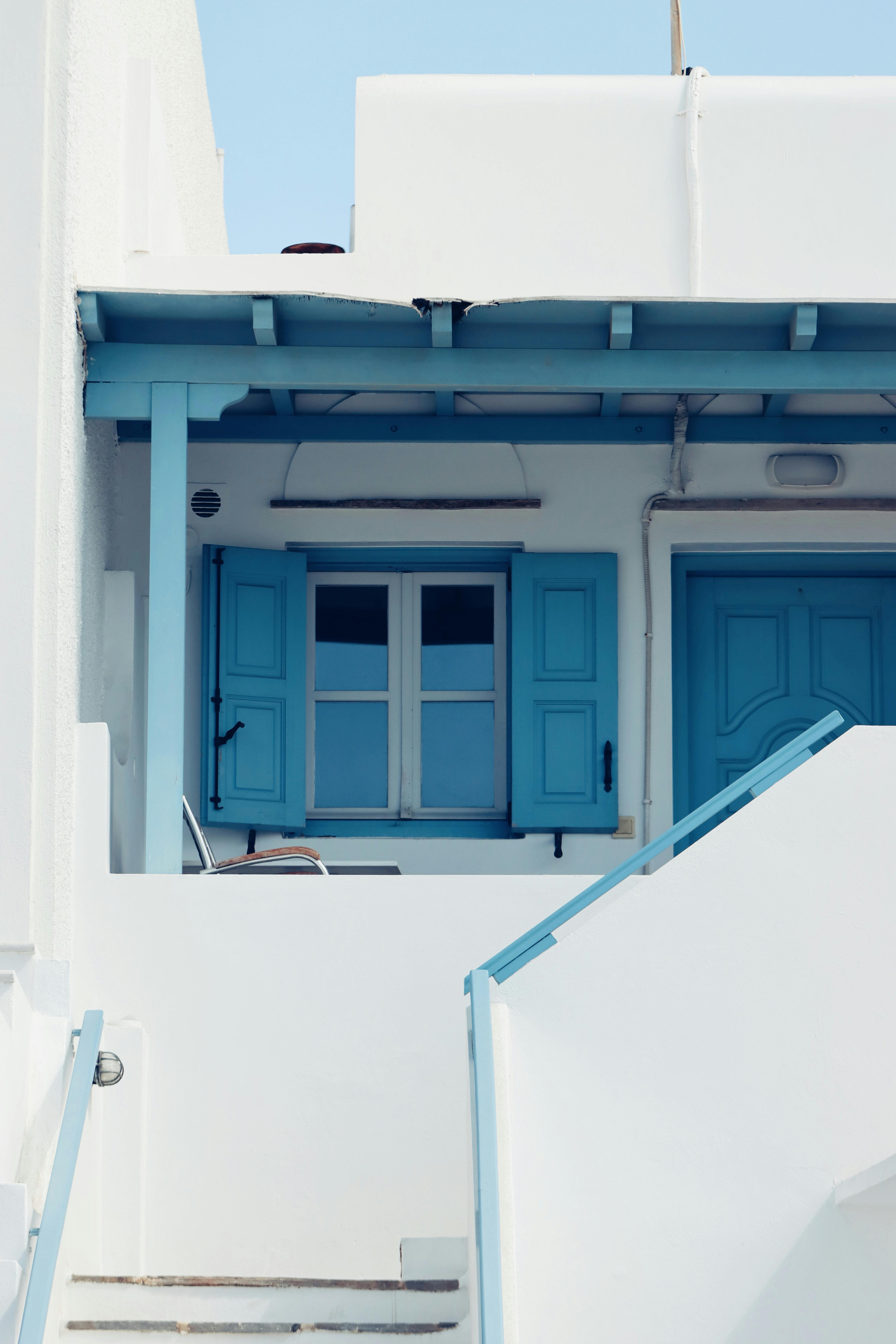 Explore the iconic blue and white architecture of Naxos, Greece, showcasing Cycladic design.