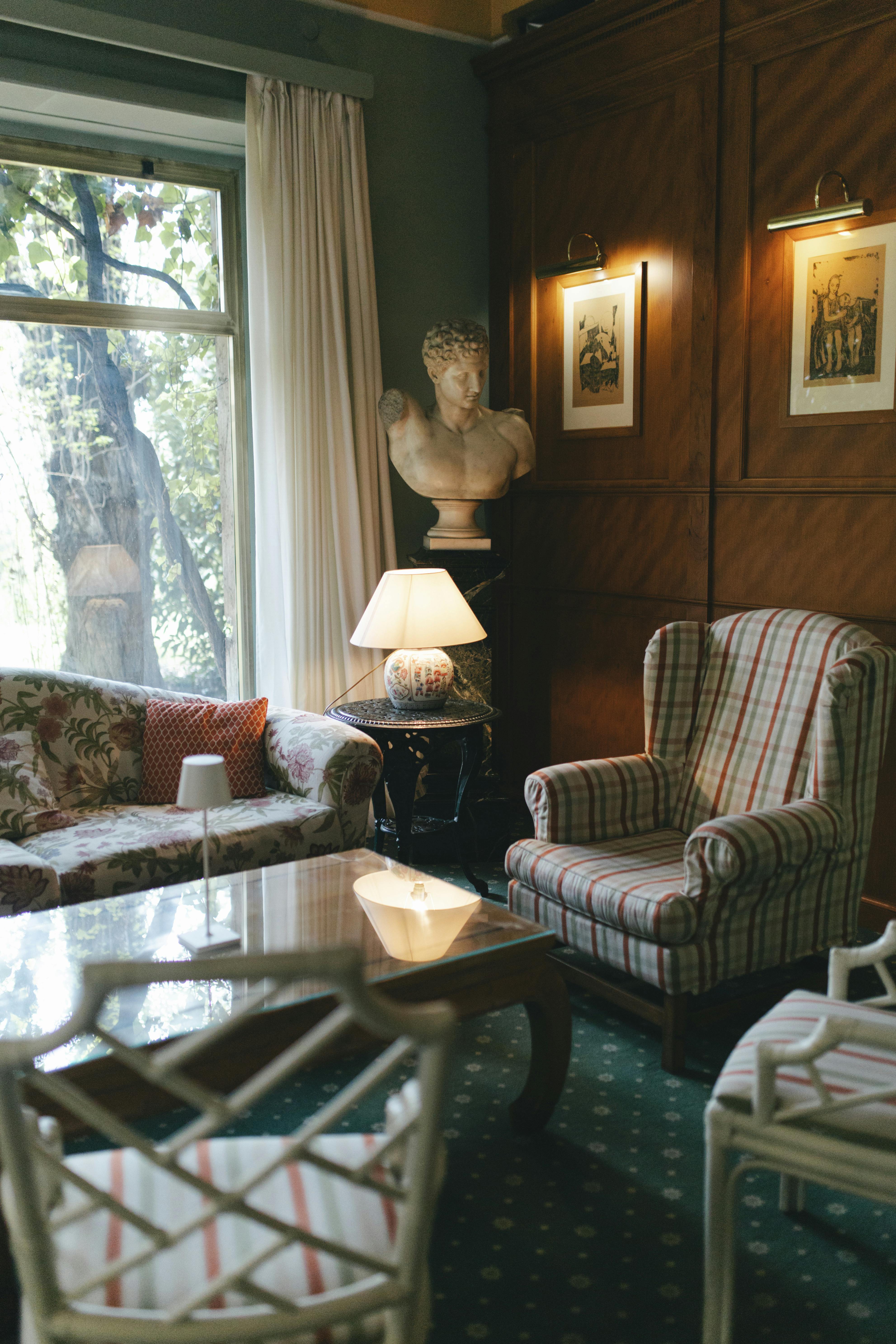 Cozy vintage living room with classic furniture and decor elements.