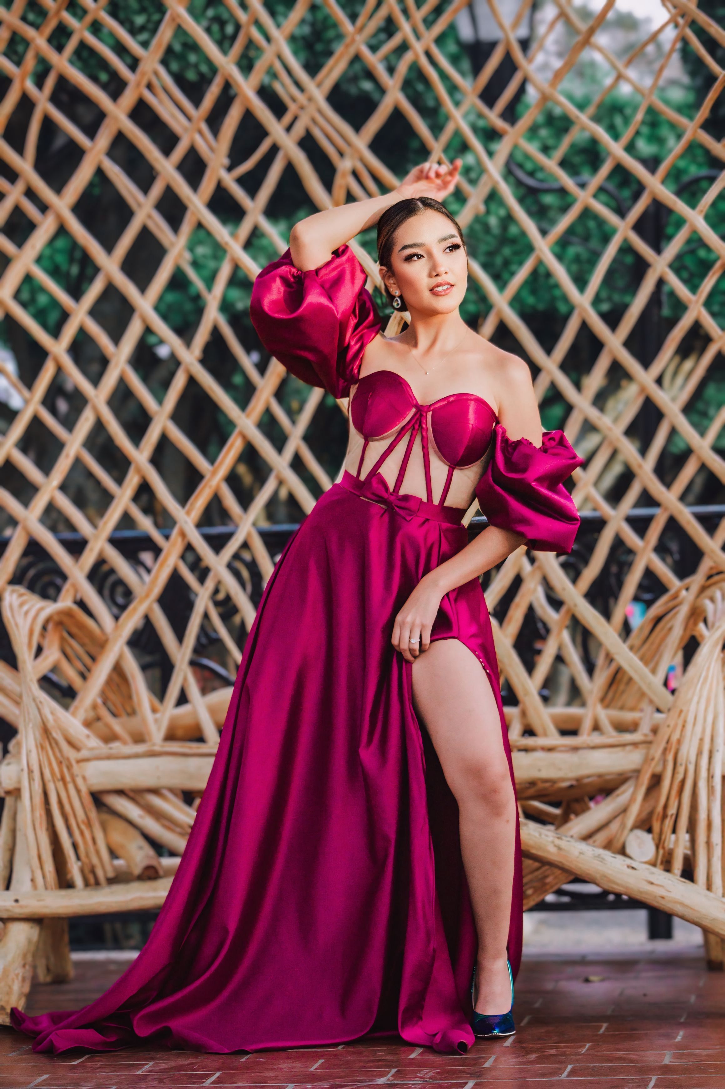 Elegant Woman in Vibrant Magenta Gown Outdoors · Free Stock Photo