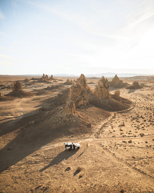 Free Aerial Photo of Vehicle Near Rock Formations Stock Photo