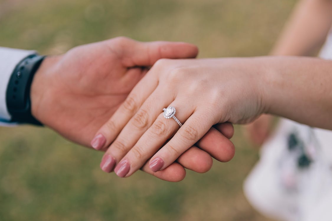 wedding ring on woman's finger
