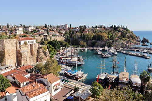 Free A stunning aerial view of Antalya's historic harbor with yachts and surrounding architecture on a sunny day. Stock Photo