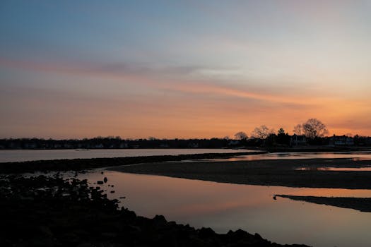Tranquil sunrise with reflections at Cove Island Park, Stamford, Connecticut.