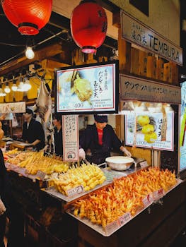 Bustling Japanese street market scene with tempura display. Perfect for food and travel themes.