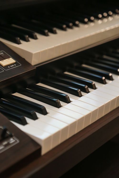 Close-Up of Double Electronic Keyboard · Free Stock Photo