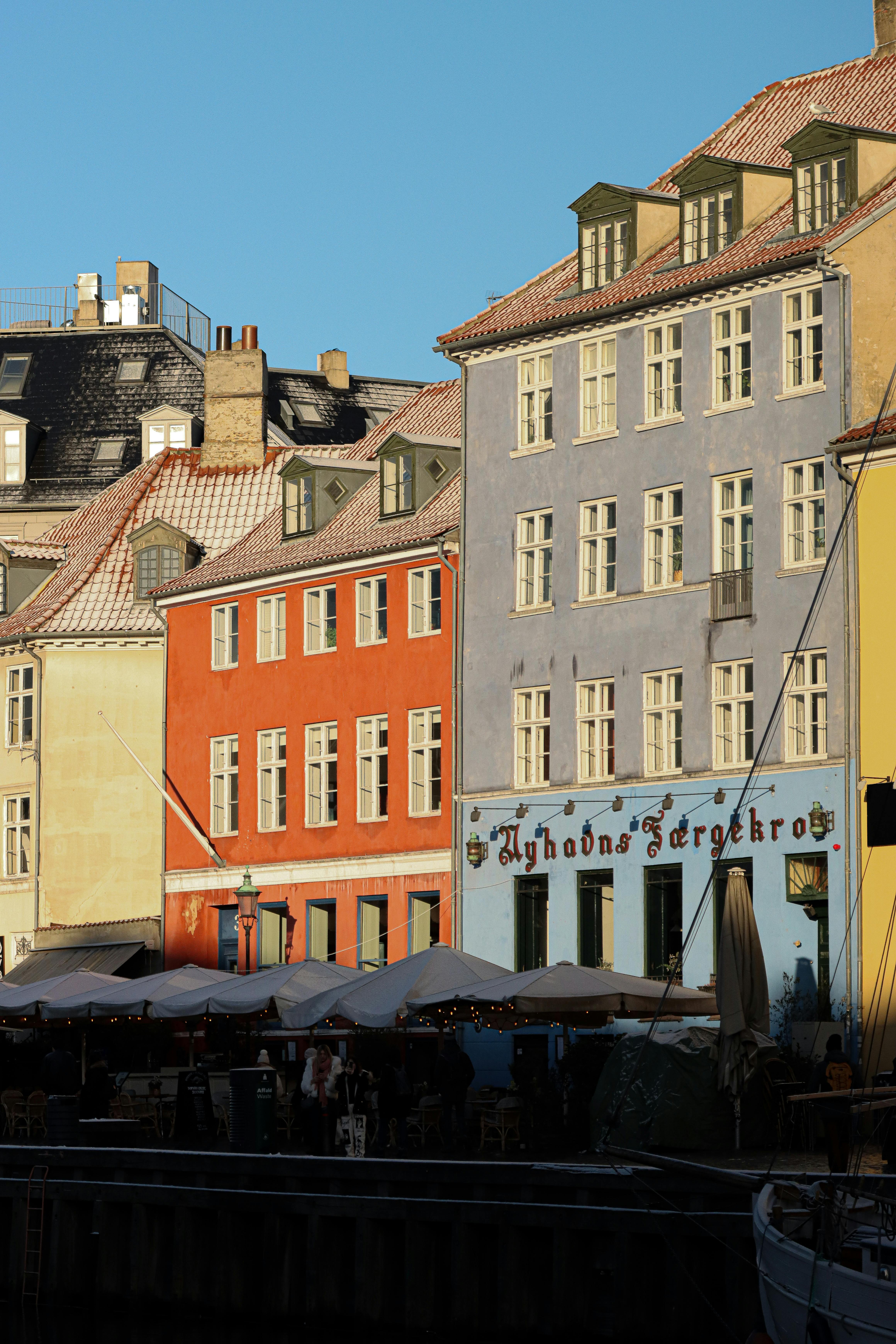 Vibrant historic buildings along the Nyhavn canal in Copenhagen, Denmark.