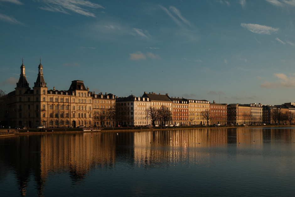 Beautiful waterfront view of colorful historic buildings in Copenhagen, Denmark.
