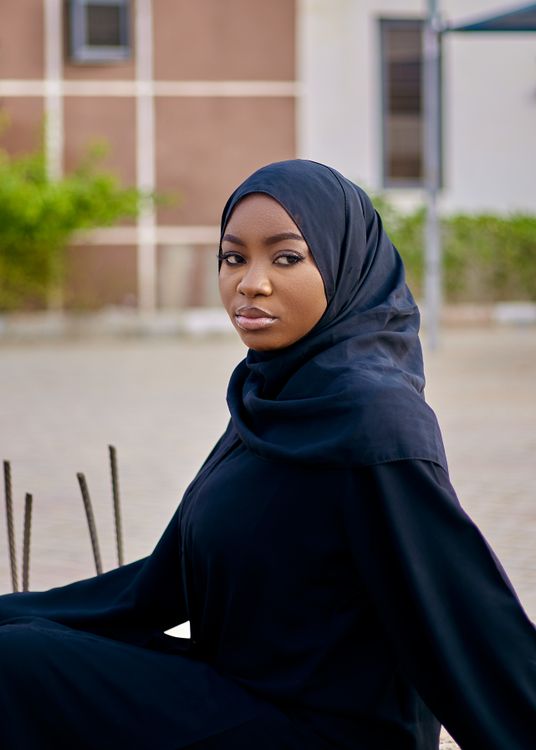 Portrait of a Woman in Black Hijab Outdoors · Free Stock Photo