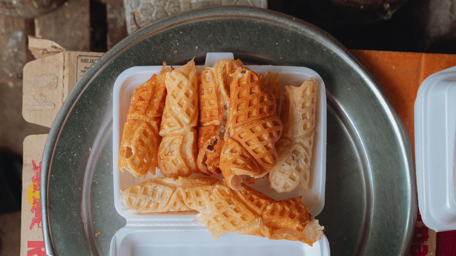 Delicious Vietnamese waffles served on a tray, showcasing local street food culture.