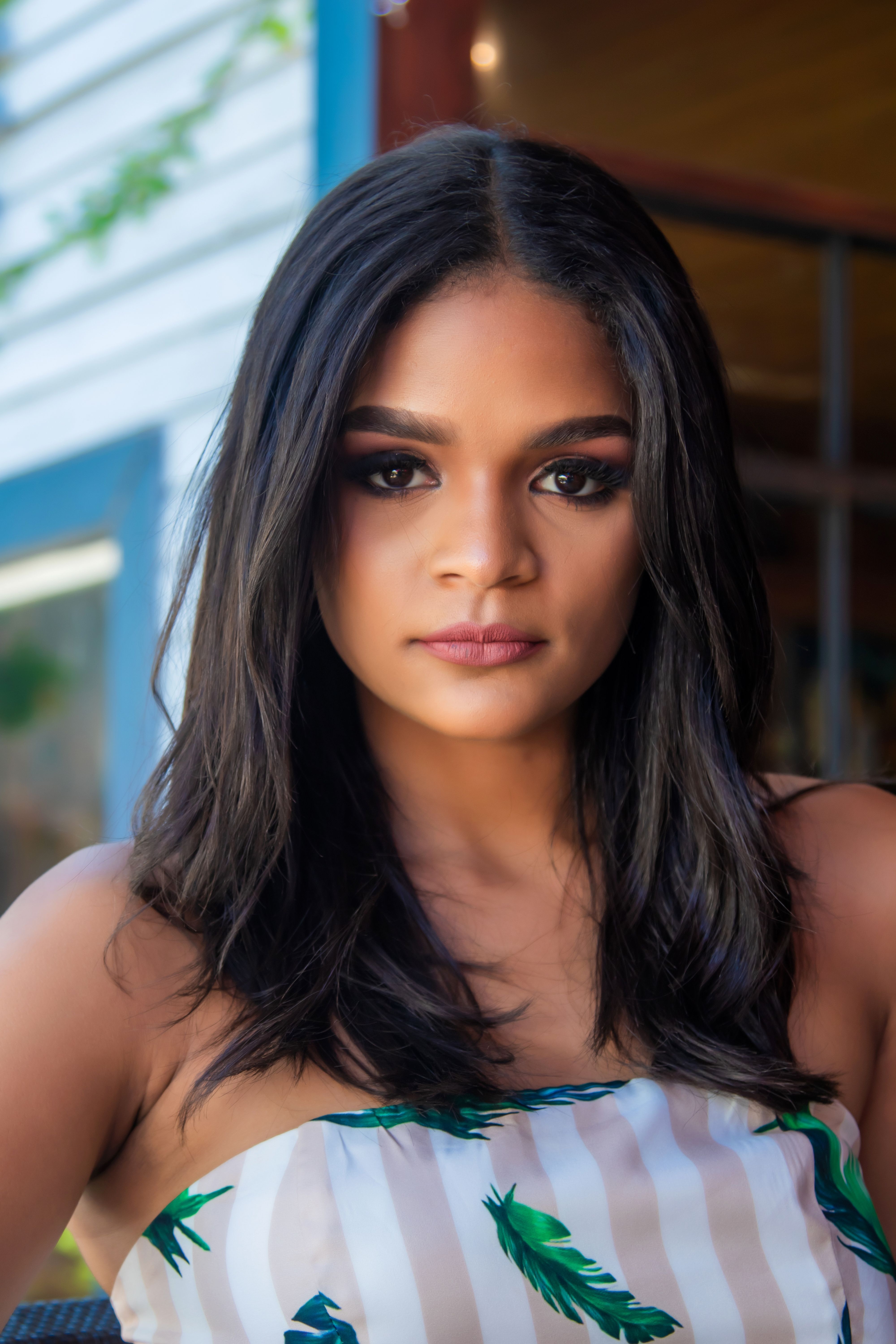 Stunning portrait of a young woman with natural makeup and dark hair in Puerto Plata.