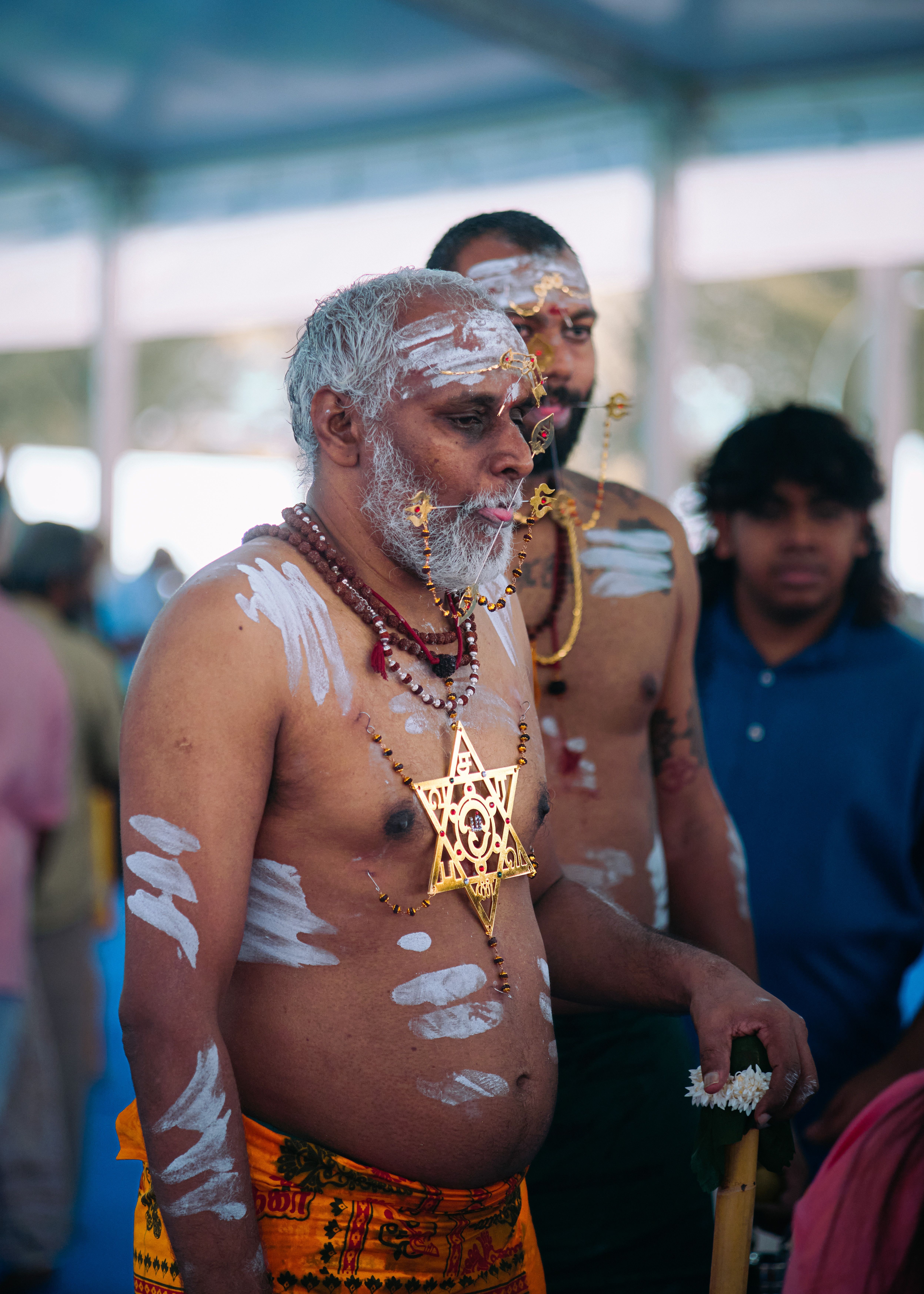 Hindu Ritual Participants with Traditional Symbols · Free Stock Photo