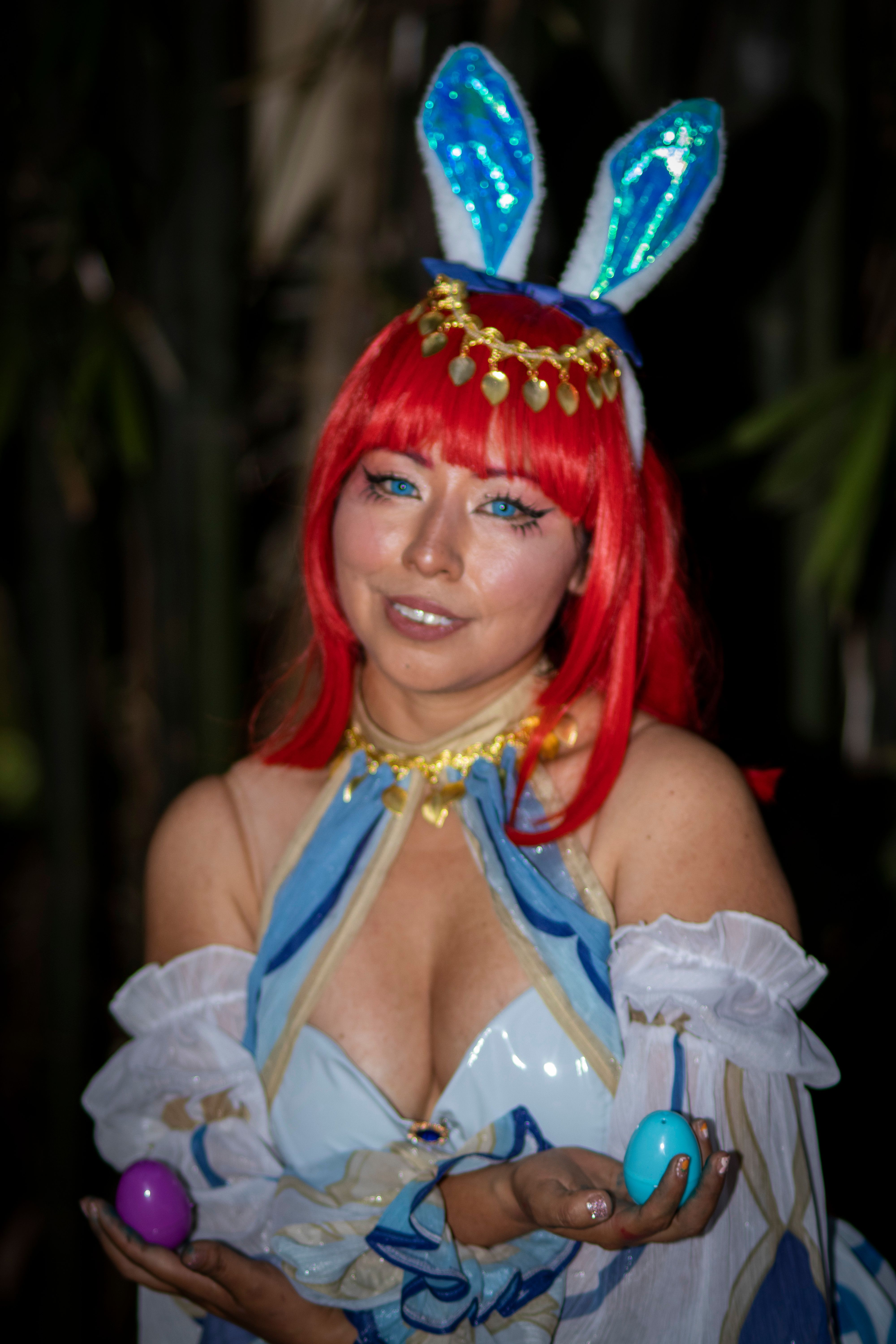 Cosplayer with Bright Costume and Bunny Ears