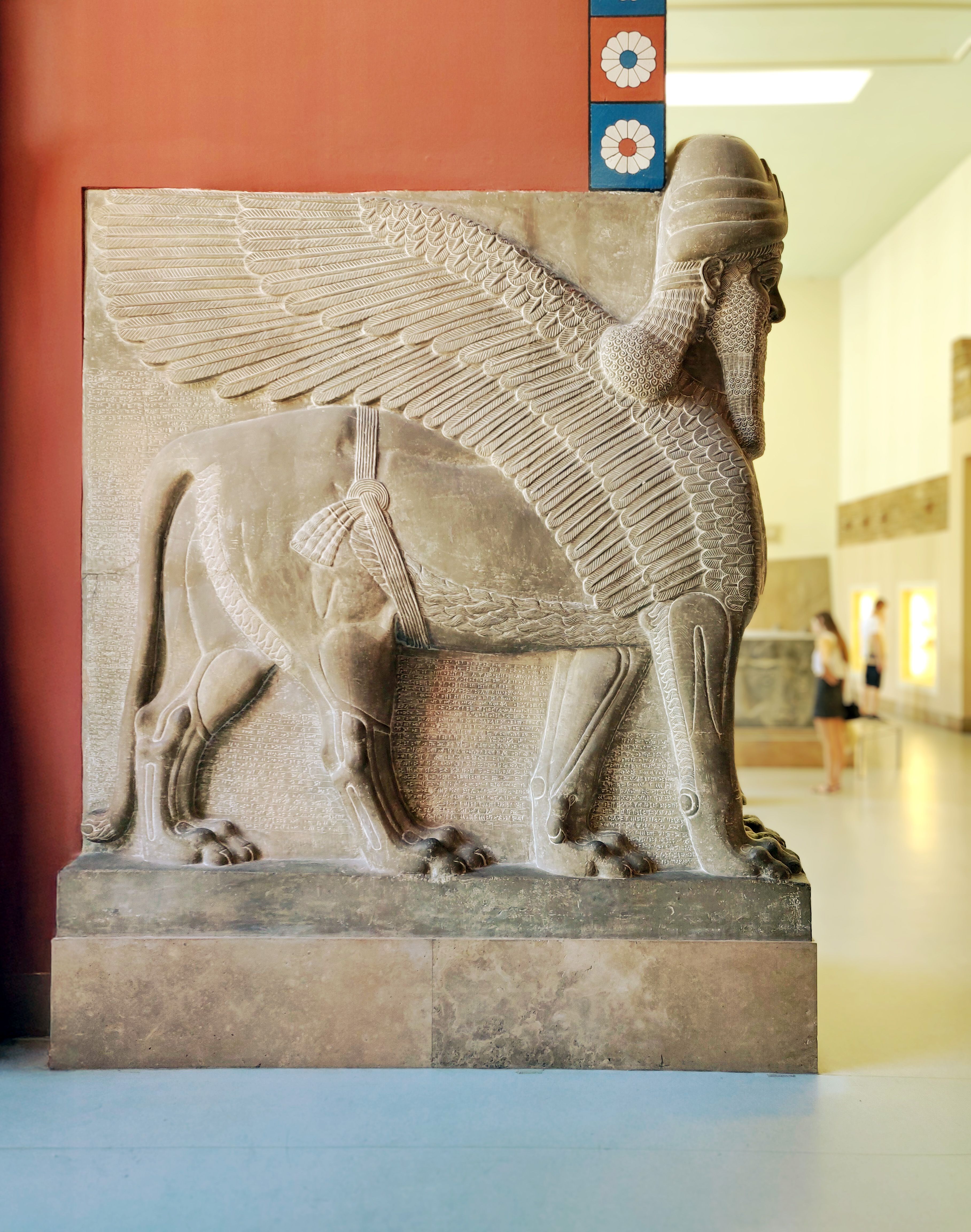 Sculpture of an ancient winged bull at a museum in Berlin, Germany.
