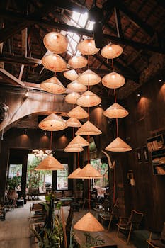 Charming Vietnamese coffee shop with traditional lanterns and rustic wooden decor in Ho Chi Minh City.