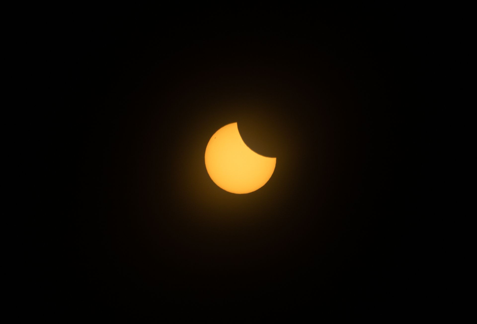 A mesmerizing view of a solar eclipse with a glowing corona, highlighting the cosmic phenomenon.