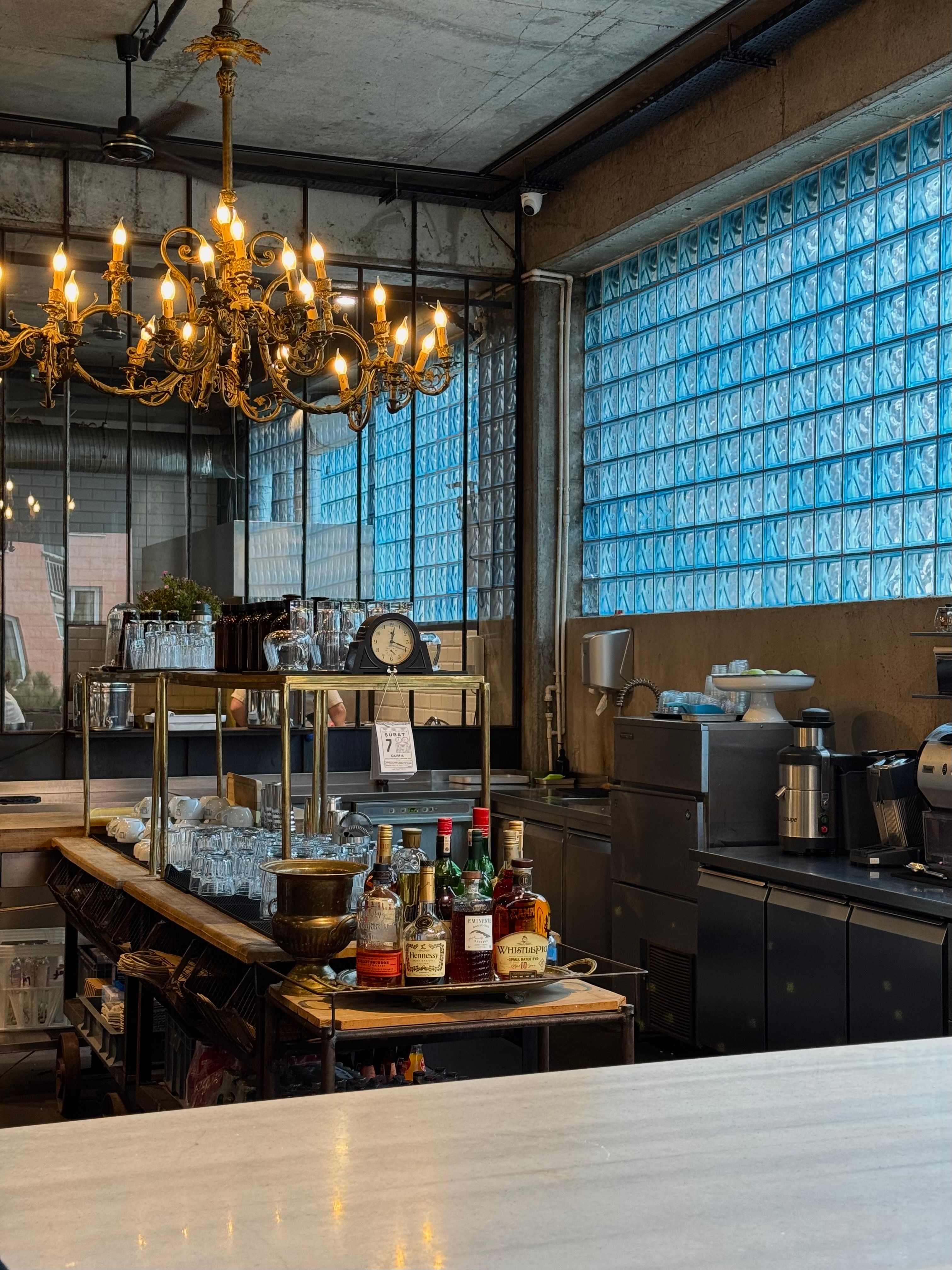 Chic Industrial Coffee Bar Interior with Chandelier · Free Stock Photo