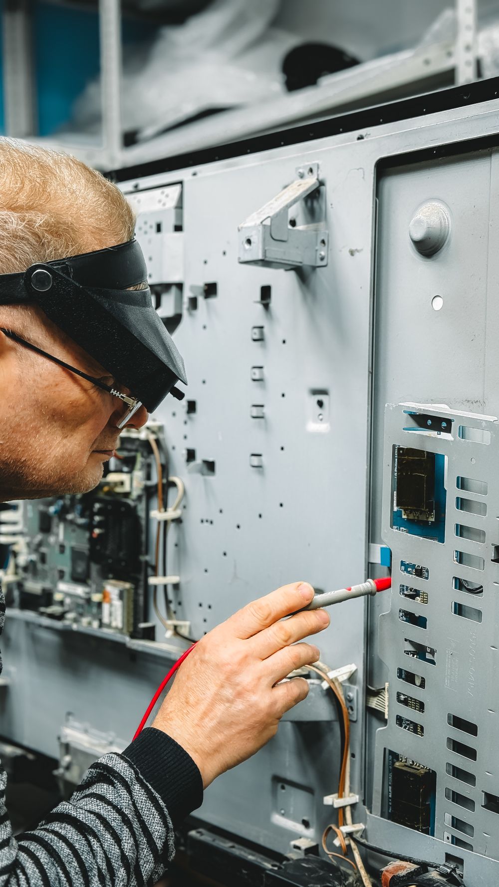 Technician working on industrial machinery