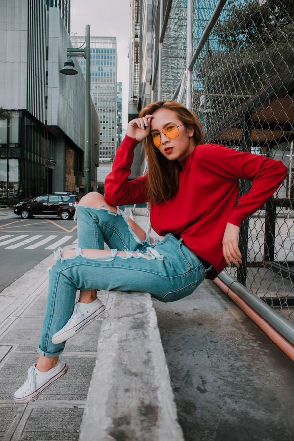 Half-tucked sweater with straight-leg jeans