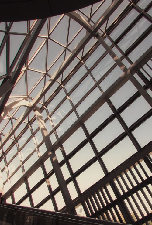Free Sunlit glass ceiling with steel framework in Lyon, France, showcasing modern architectural design. Stock Photo