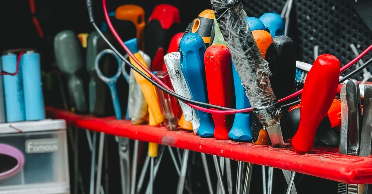 Organized Workbench with Various Hand Tools · Free Stock Photo