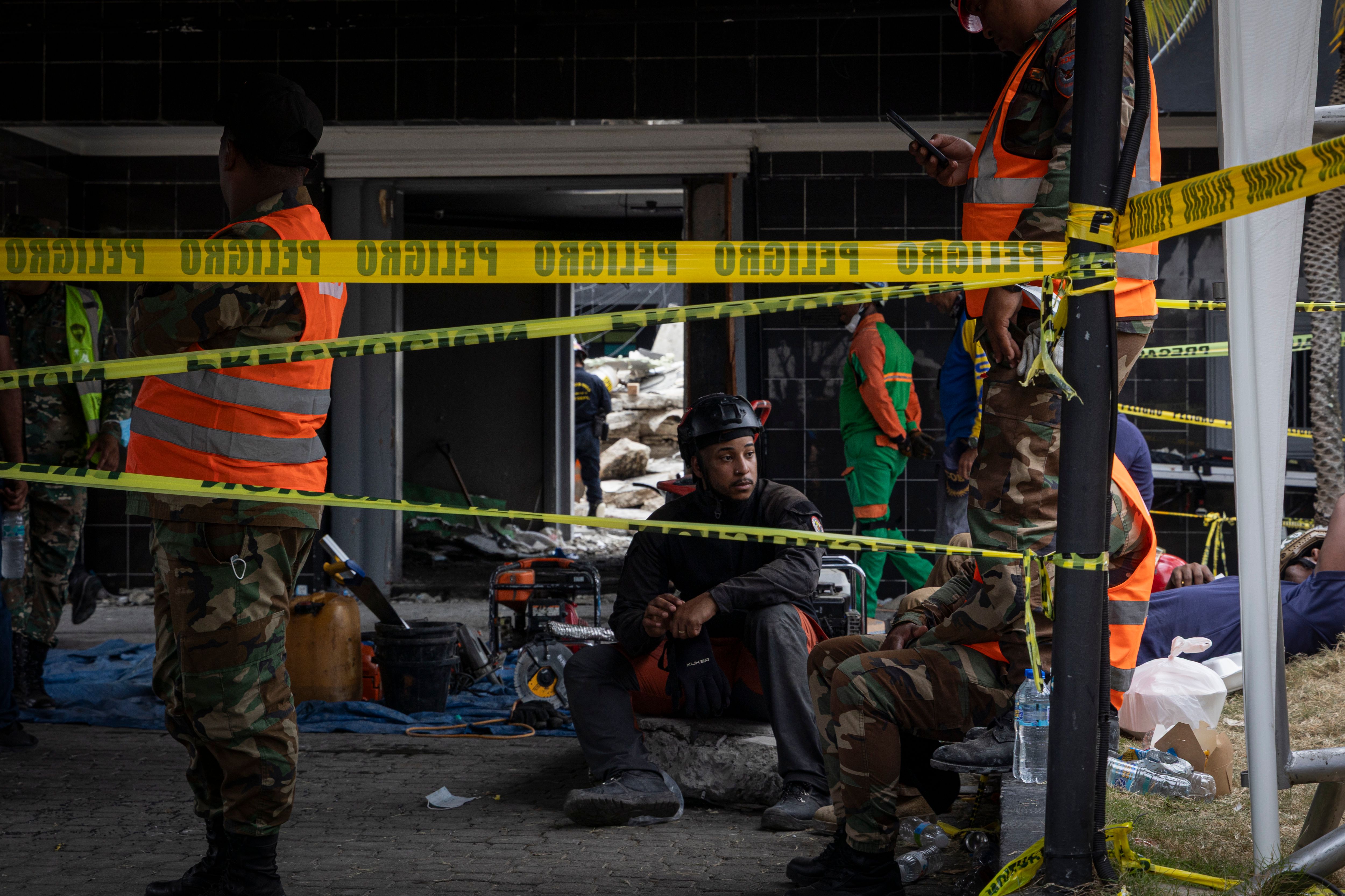 Rescue Workers at Scene of Emergency Aftermath · Free Stock Photo