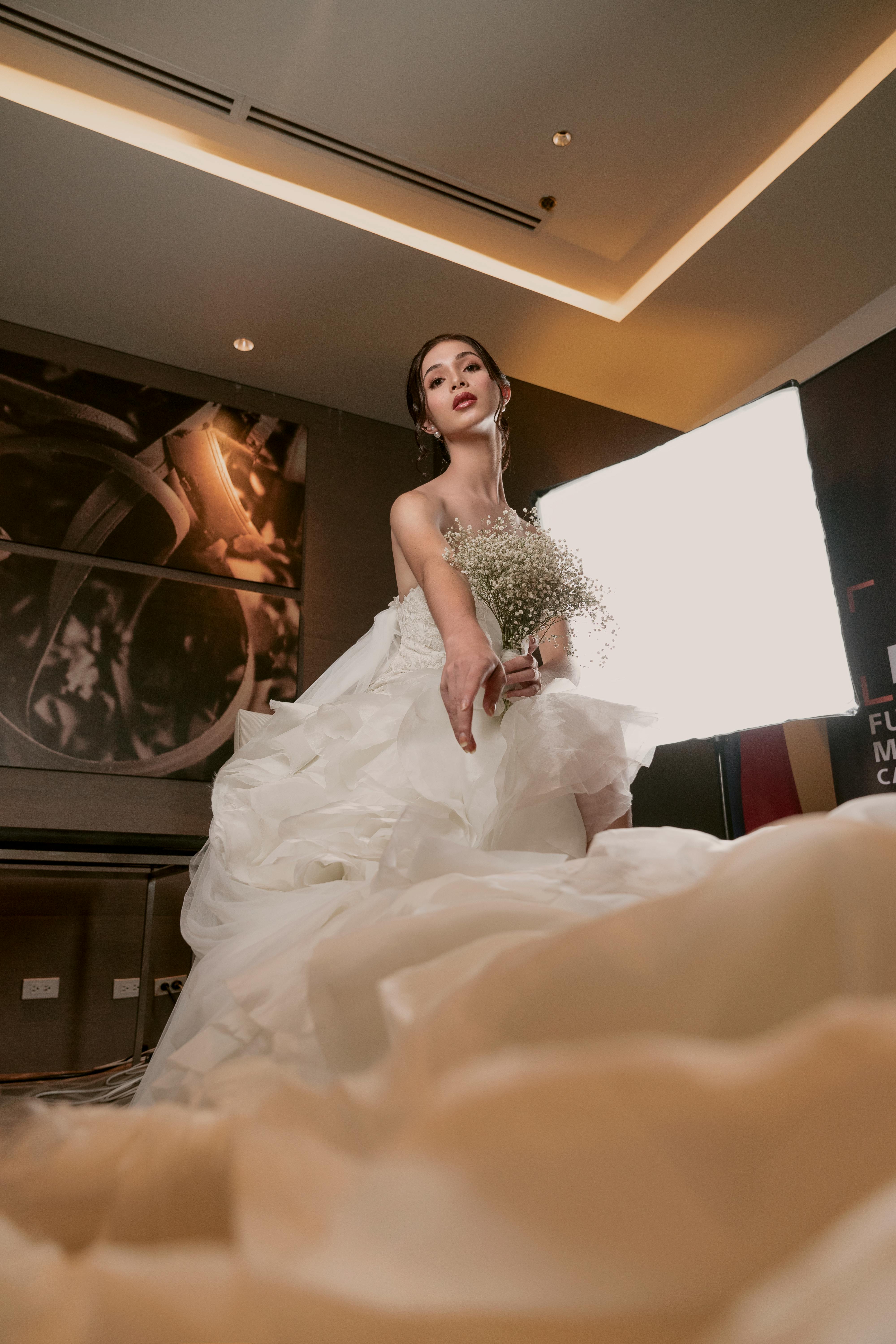 Photo Of Woman Wearing White Dress