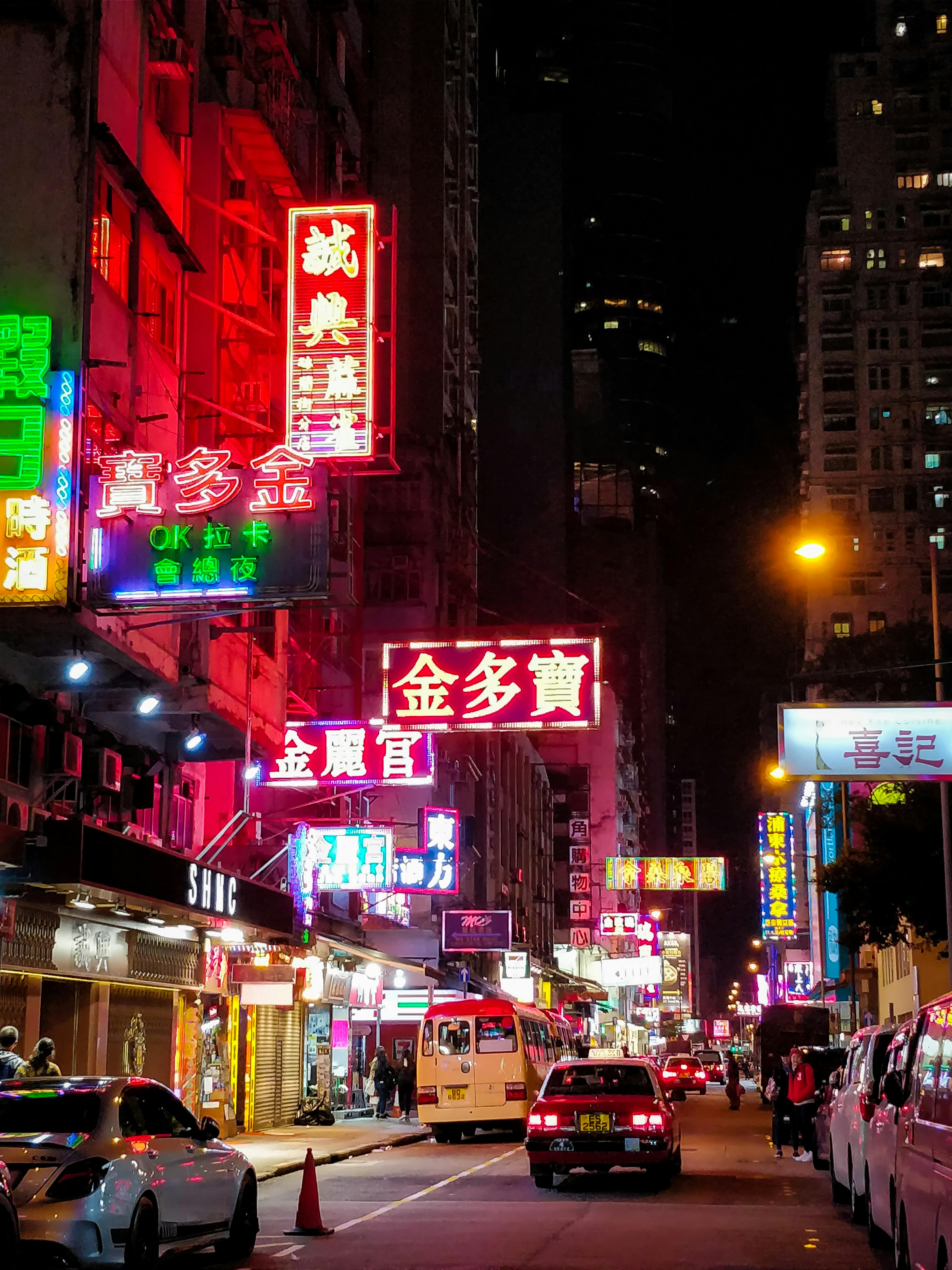 cars on street during night time