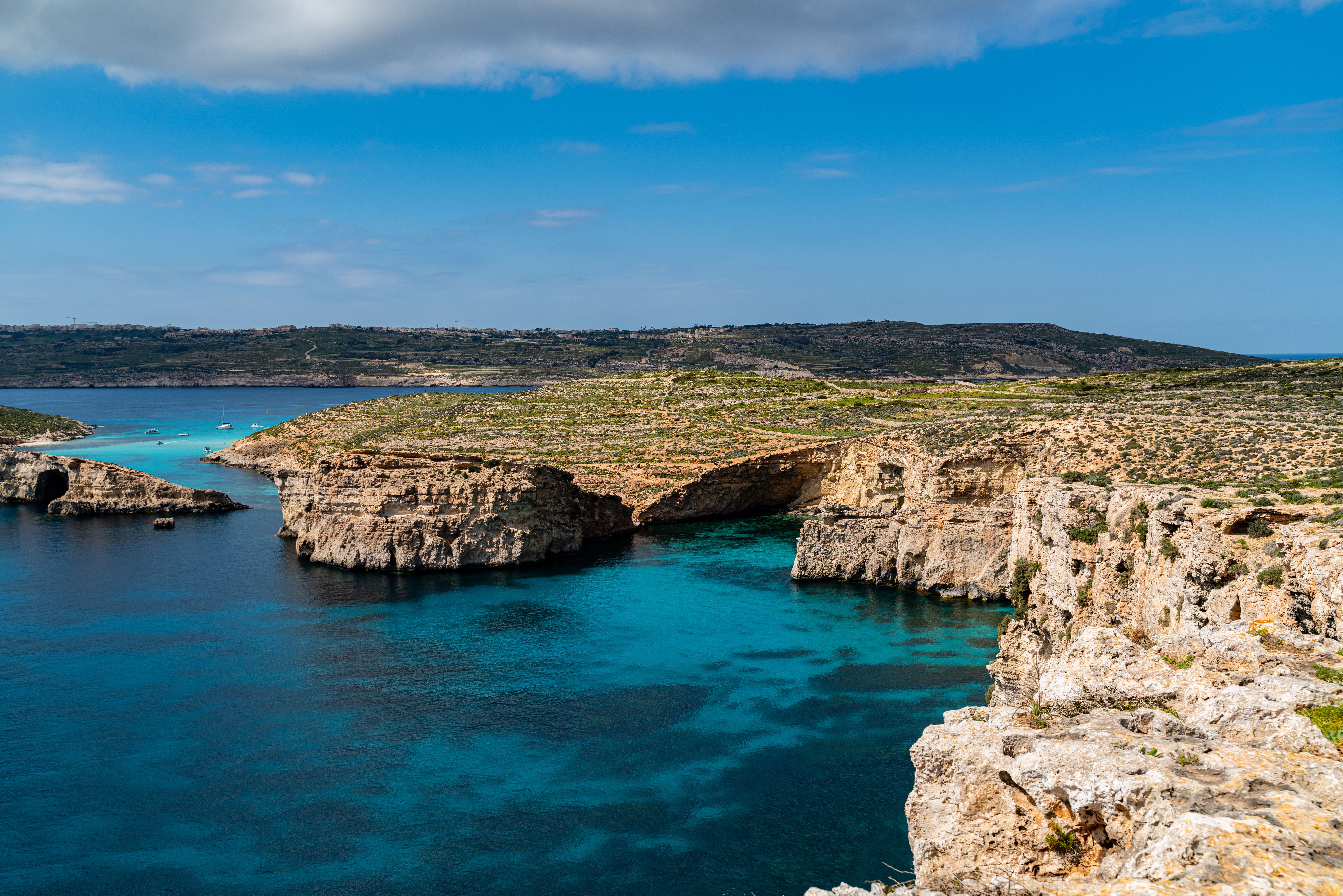 Ultimate Best Sailing Adventure with Malta Sailing Experiences Review 2026 - Beautiful azure waters and rocky cliffs under a sunny sky in Malta.