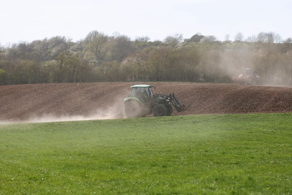 pexels photo 31586216 Farm Insurance Companies Near Me: Who's the Best in the Field? Discover top farm insurance companies near me. Compare coverage options, benefits of local agents, and find the perfect policy today! farm equipment being used in fields - farm insurance companies near me