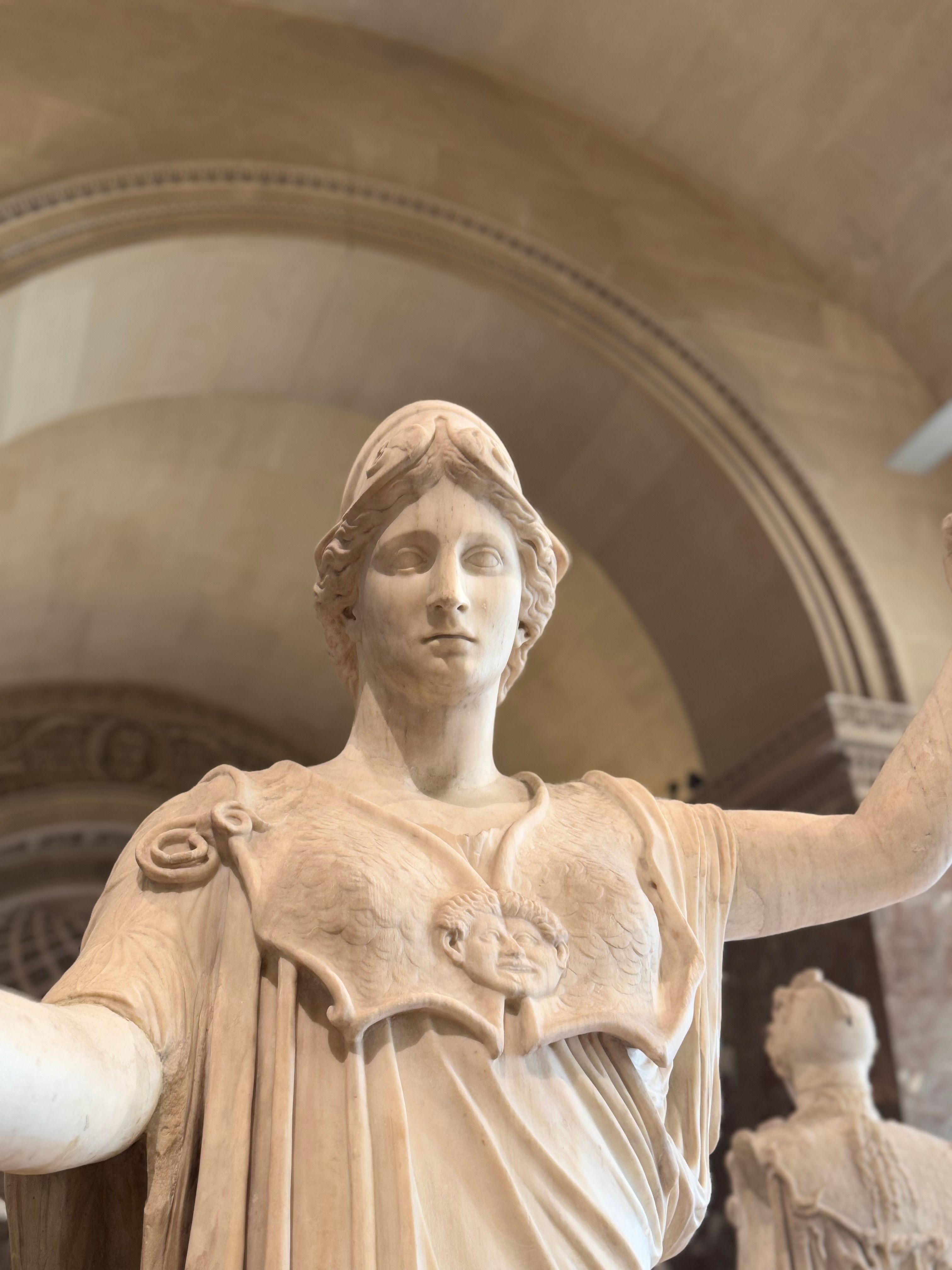 Close-up view of a classical statue in the Louvre Museum, Paris, France.