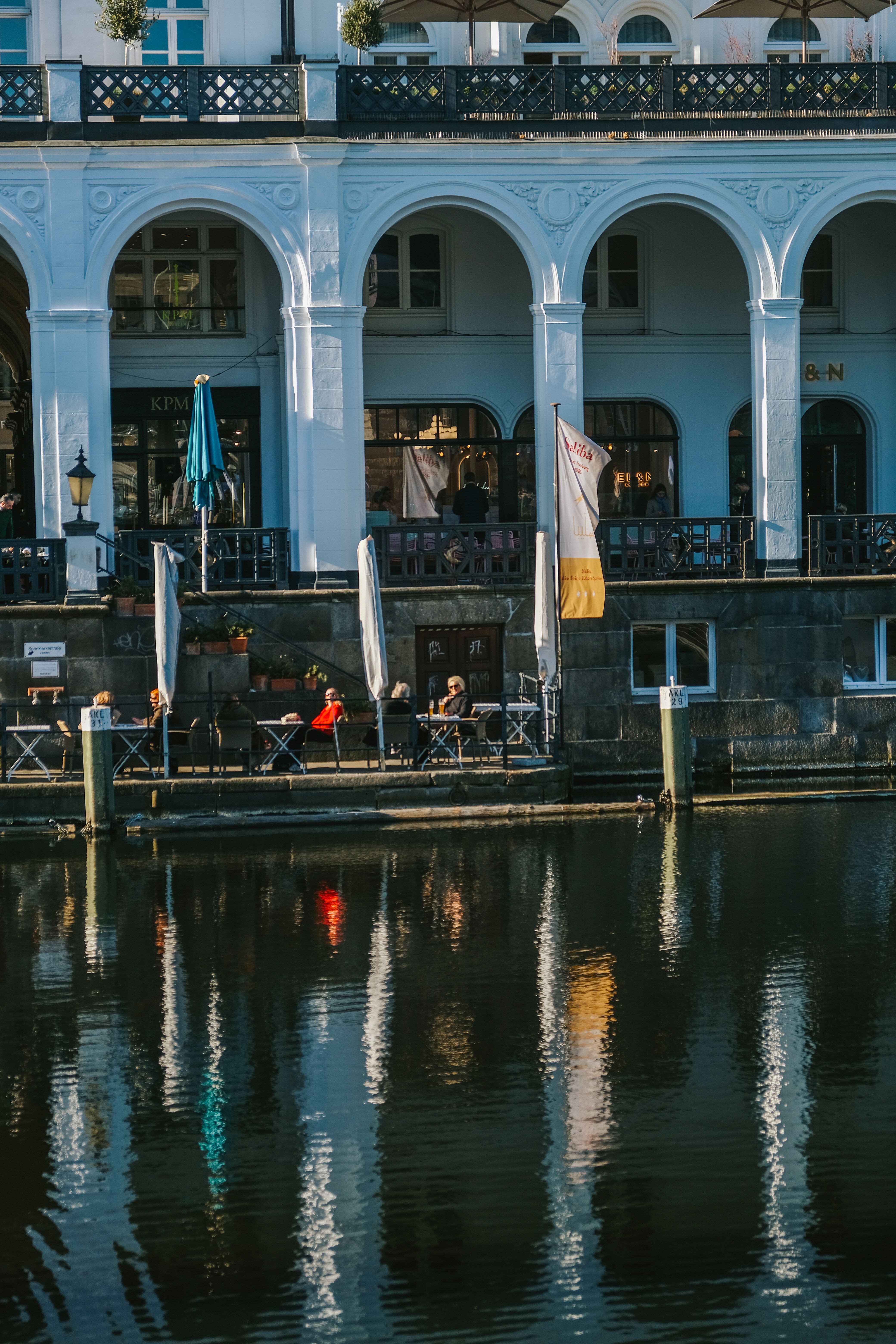 Charming Riverside Cafe in the Evening Light · Free Stock Photo
