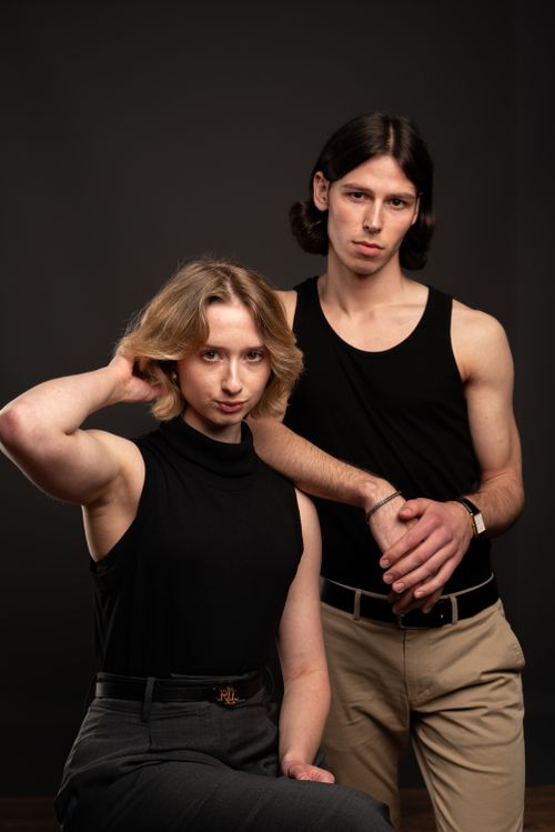Free Stylish couple posing confidently in a modern studio setting, Hamburg. Stock Photo