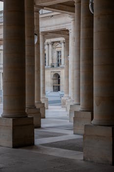 Stunning view of neoclassical columns in Paris, evoking elegance and timelessness.