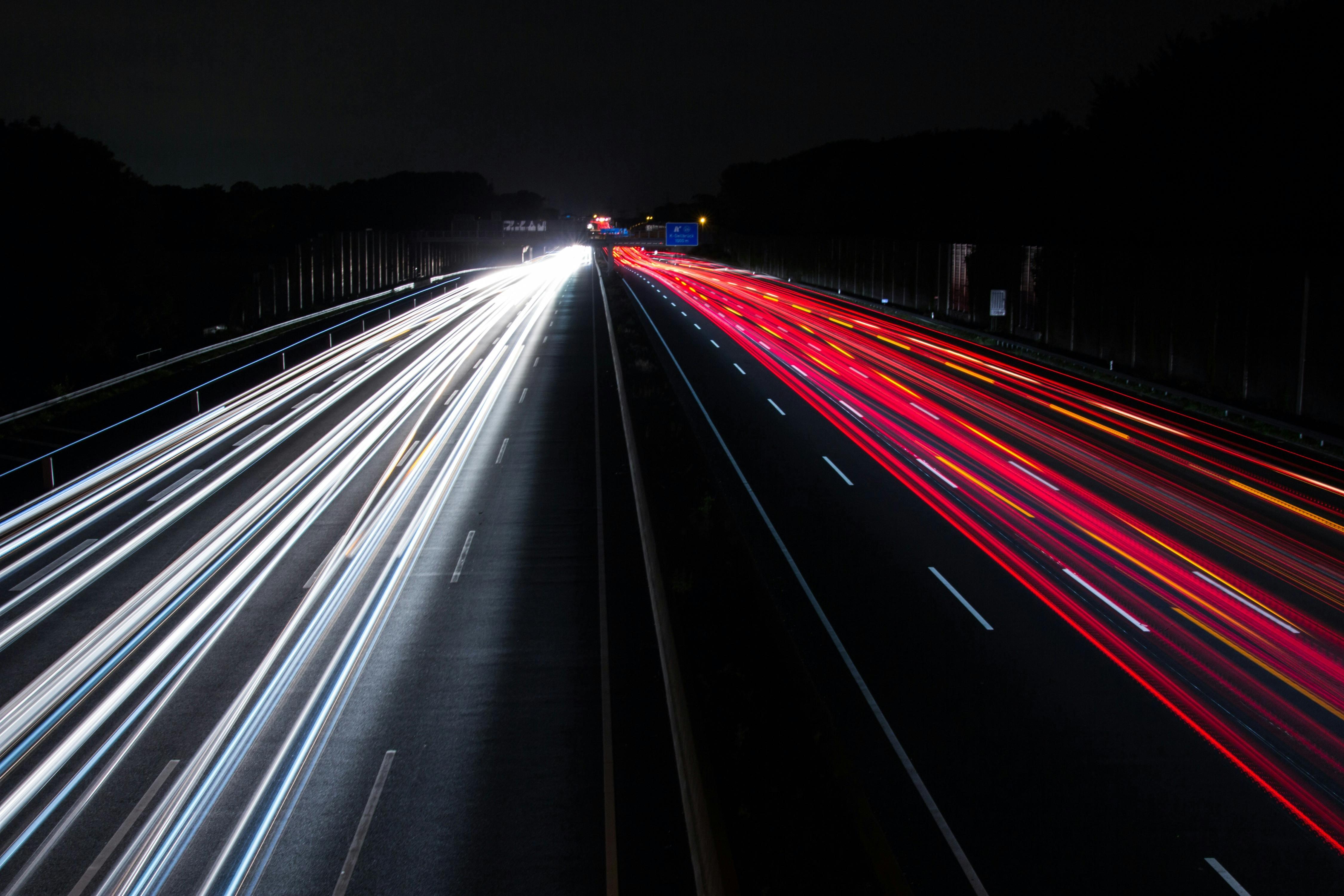 light trails on highway at night