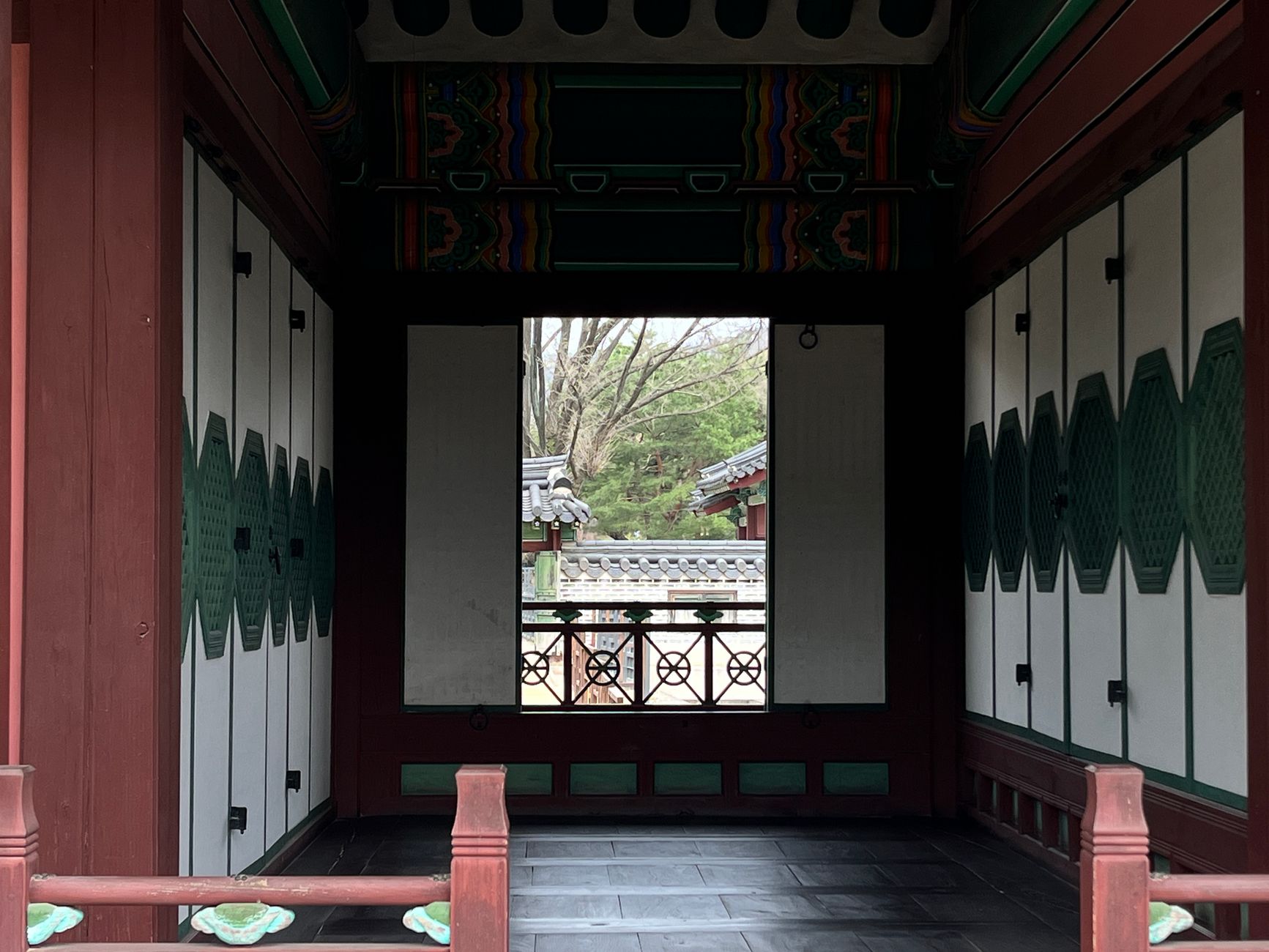 Interior view of a pavilion at Changdeokgung Palace, Seoul, showcasing traditional Korean architecture.