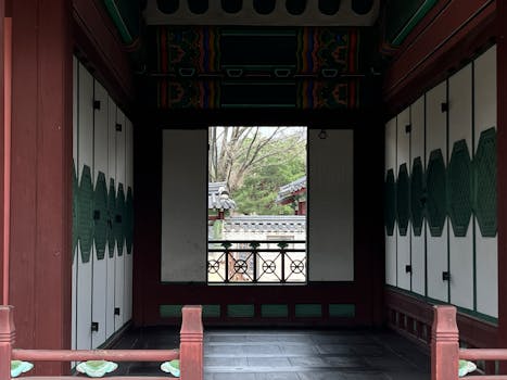 Interior view of a pavilion at Changdeokgung Palace, Seoul, showcasing traditional Korean architecture.