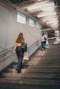 People Ascending Stairs in Tokyo's Kita Ward