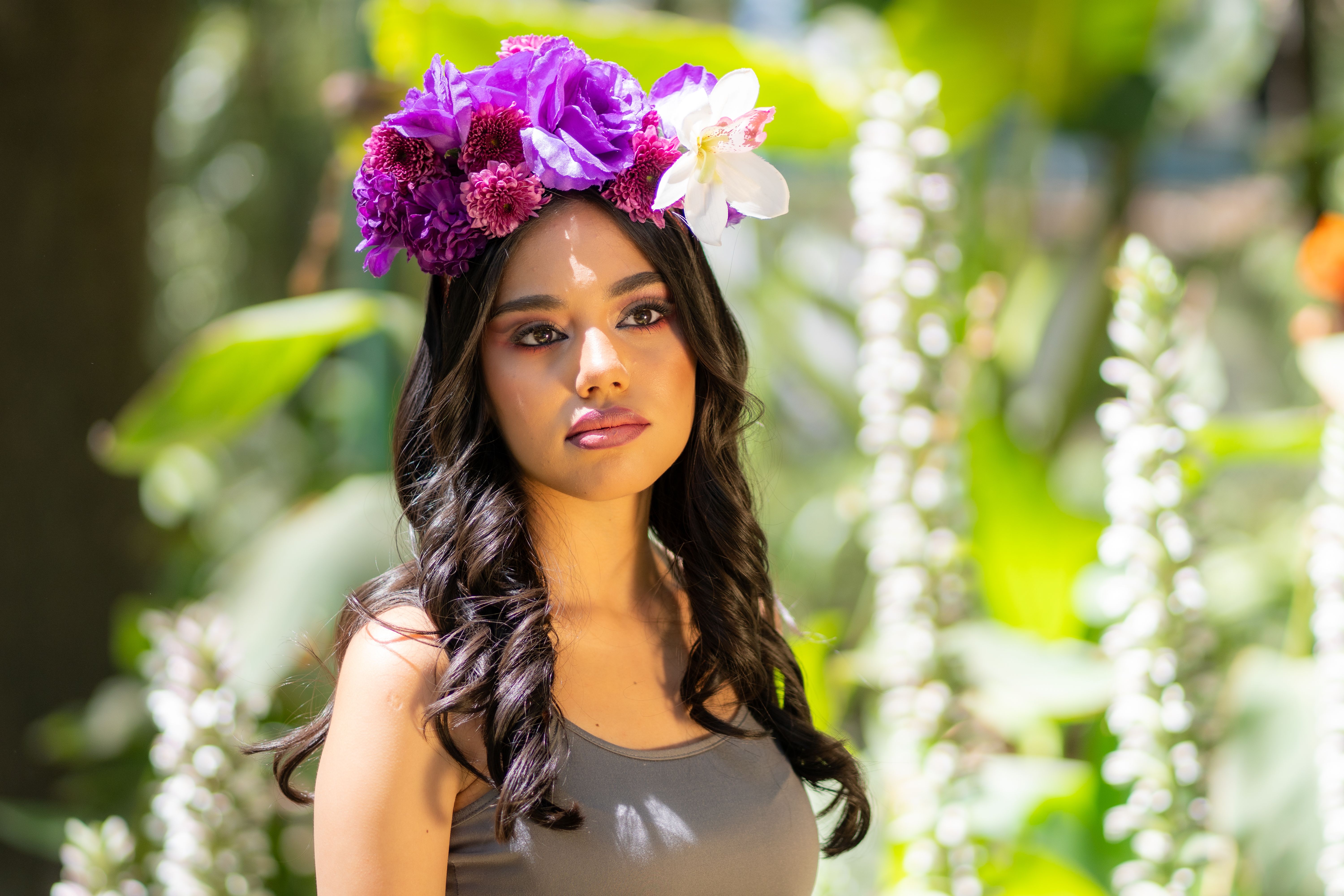 Portrait of Woman with Floral Headpiece in Garden · Free Stock Photo