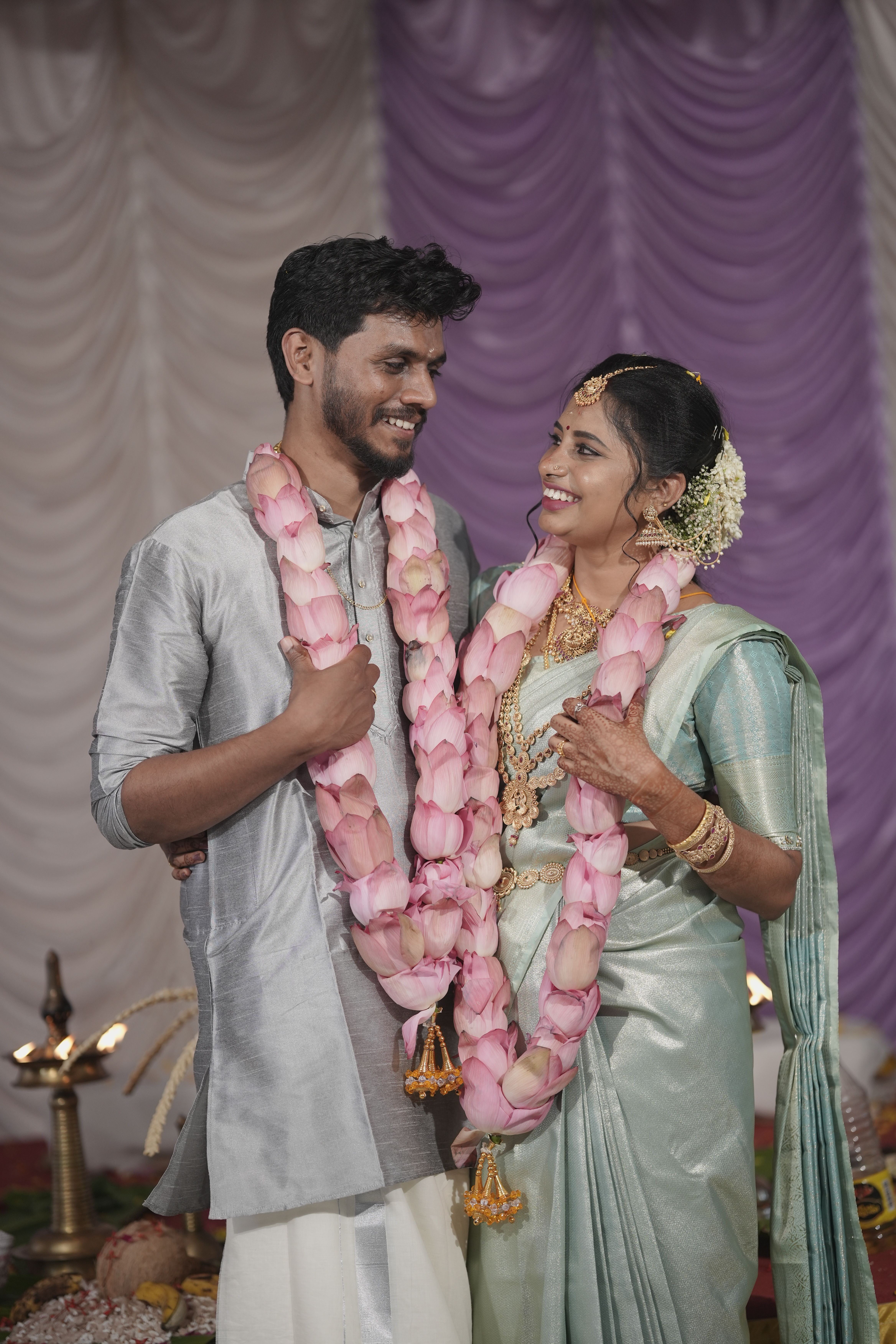 Joyful Indian Couple in Traditional Wedding Attire · Free Stock Photo