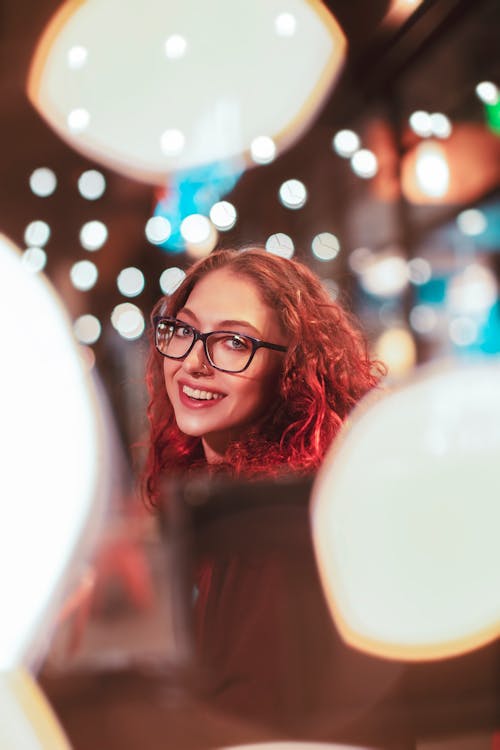 Selective Focus Photo of Woman Wearing Eyeglasses