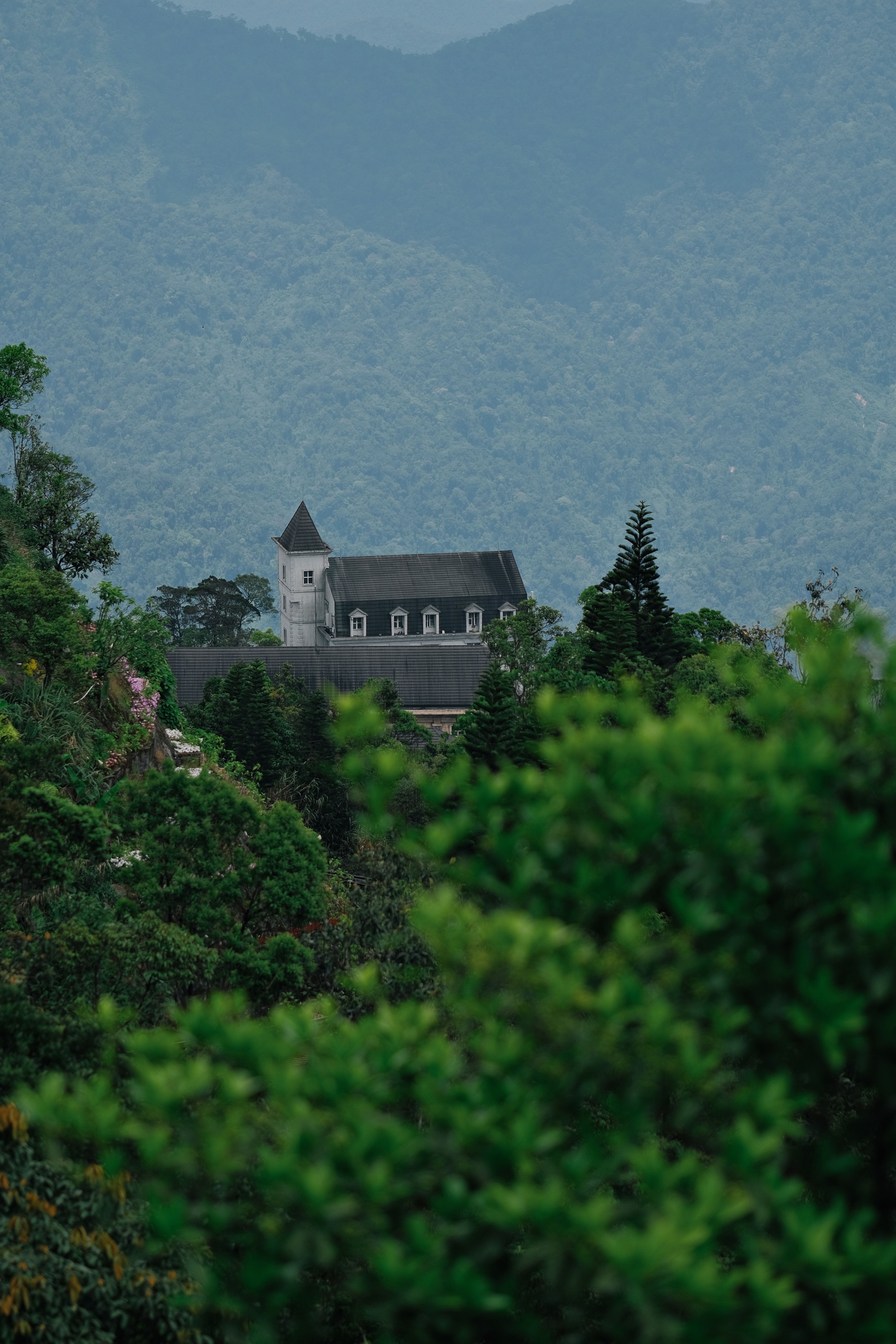 Rustic Church Amidst Lush Mountain Landscape · Free Stock Photo