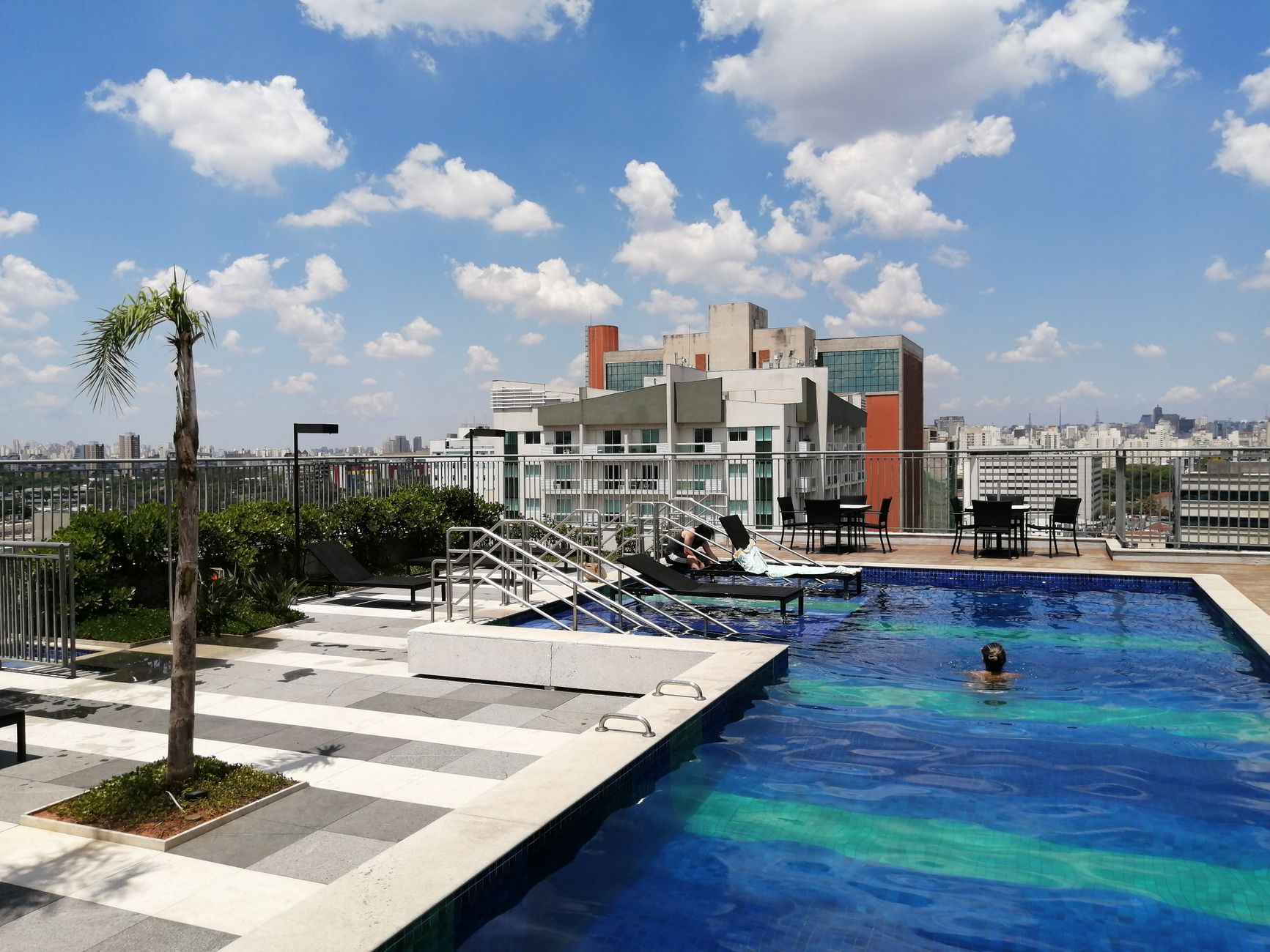 Modern rooftop pool with panoramic view in São Paulo, Brazil. Perfect for relaxation and leisure.