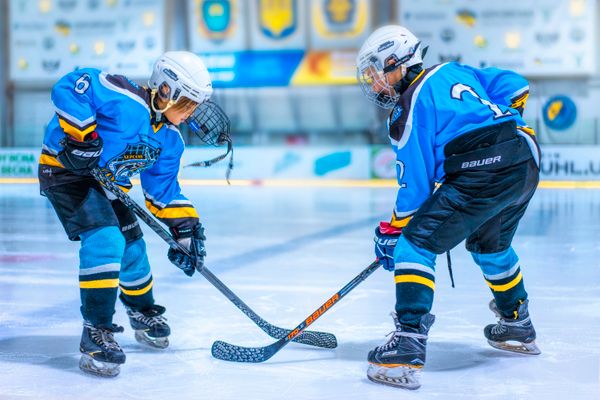 Youth hockey players on ice