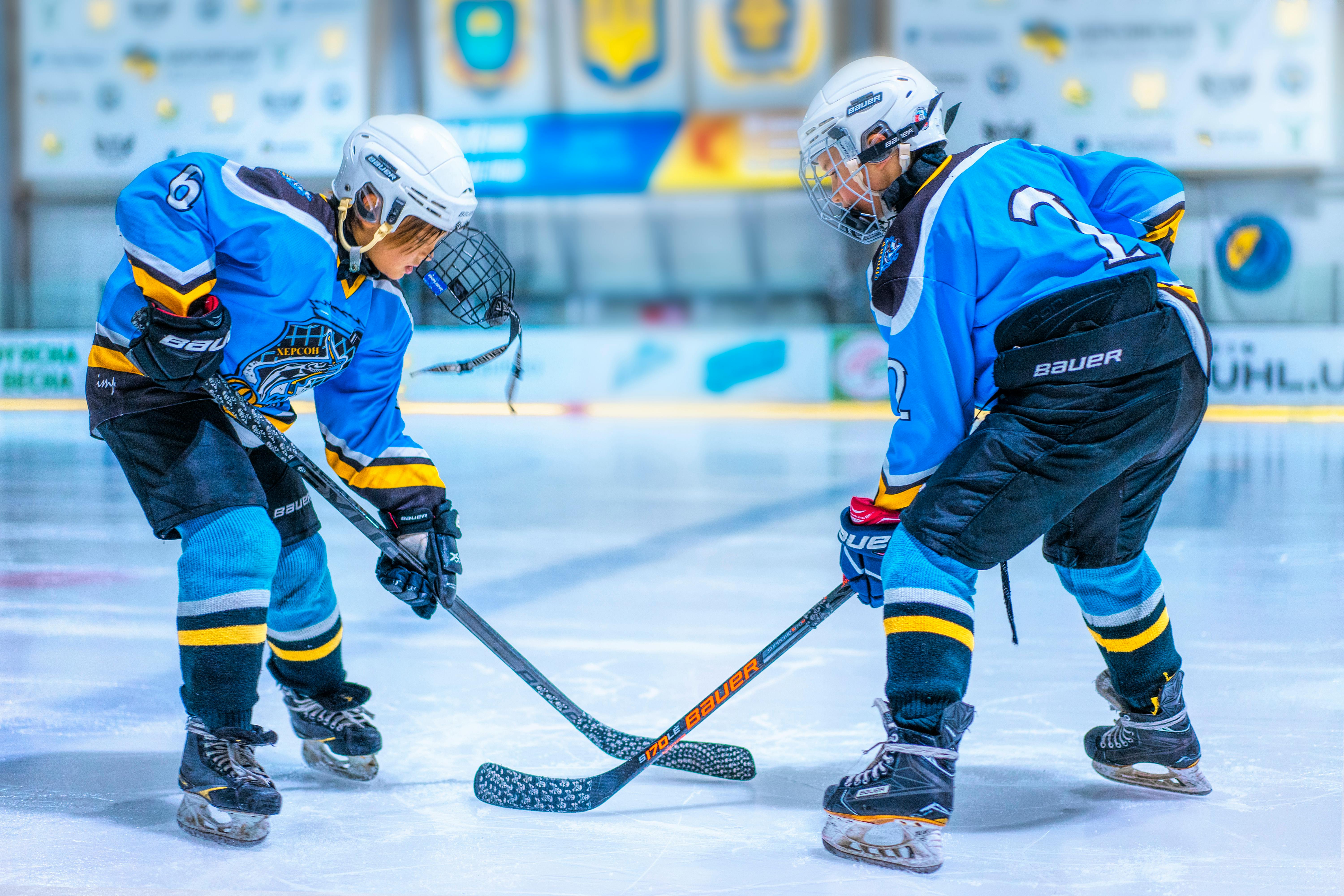 two-hockey-players-on-rink-free-stock-photo