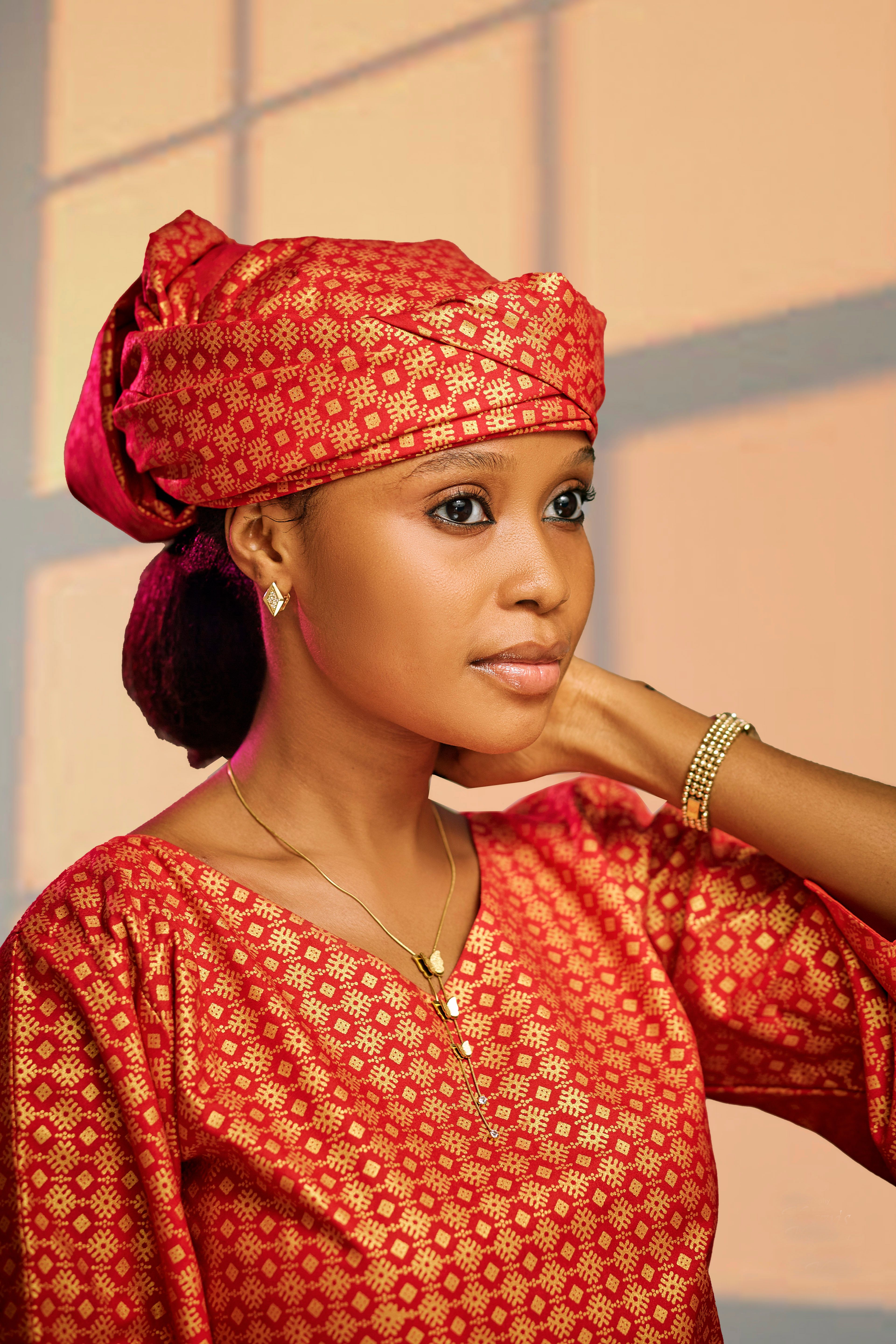 Elegant Woman in Traditional Red Attire · Free Stock Photo
