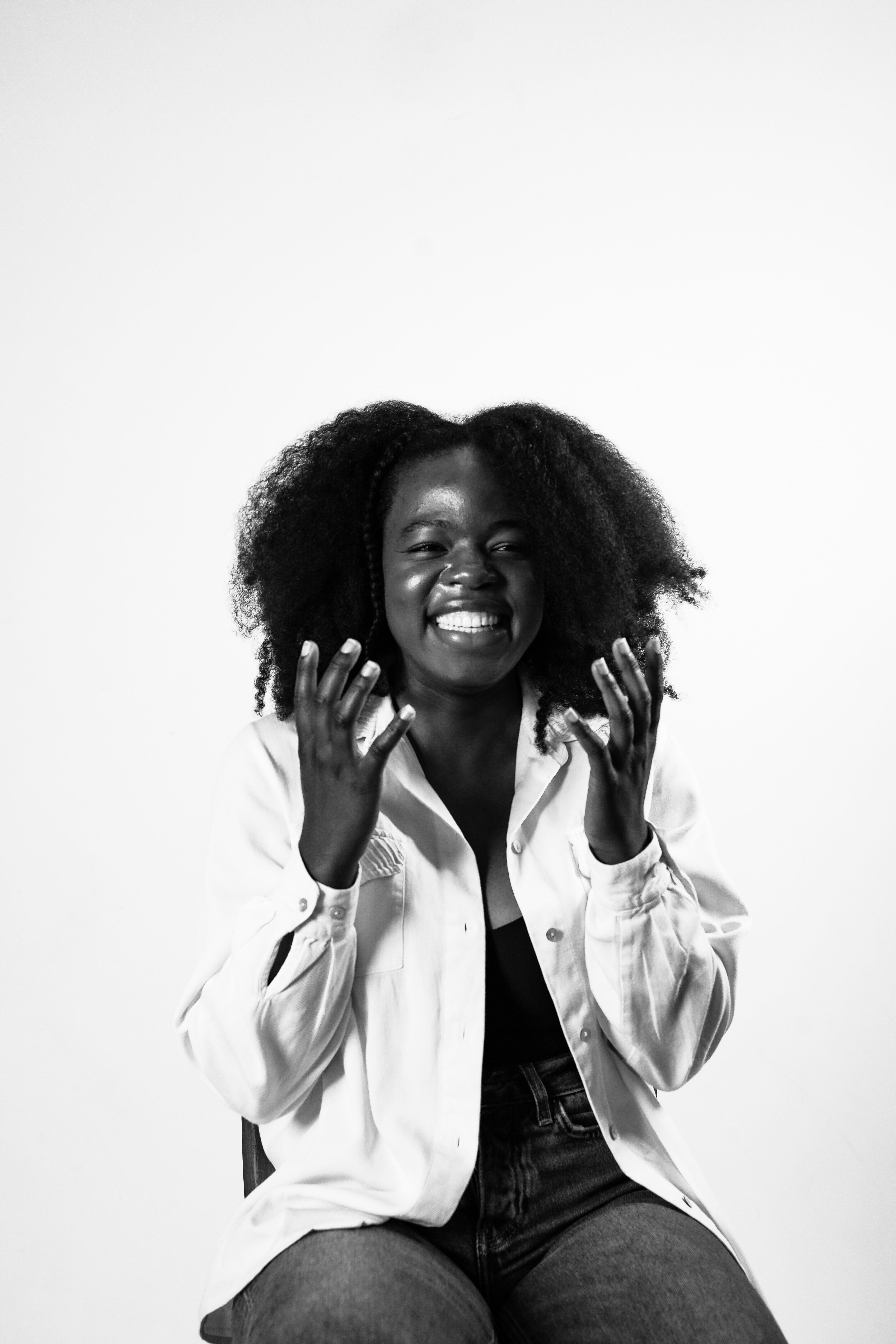 Joyful Black and White Portrait of Smiling Woman · Free Stock Photo