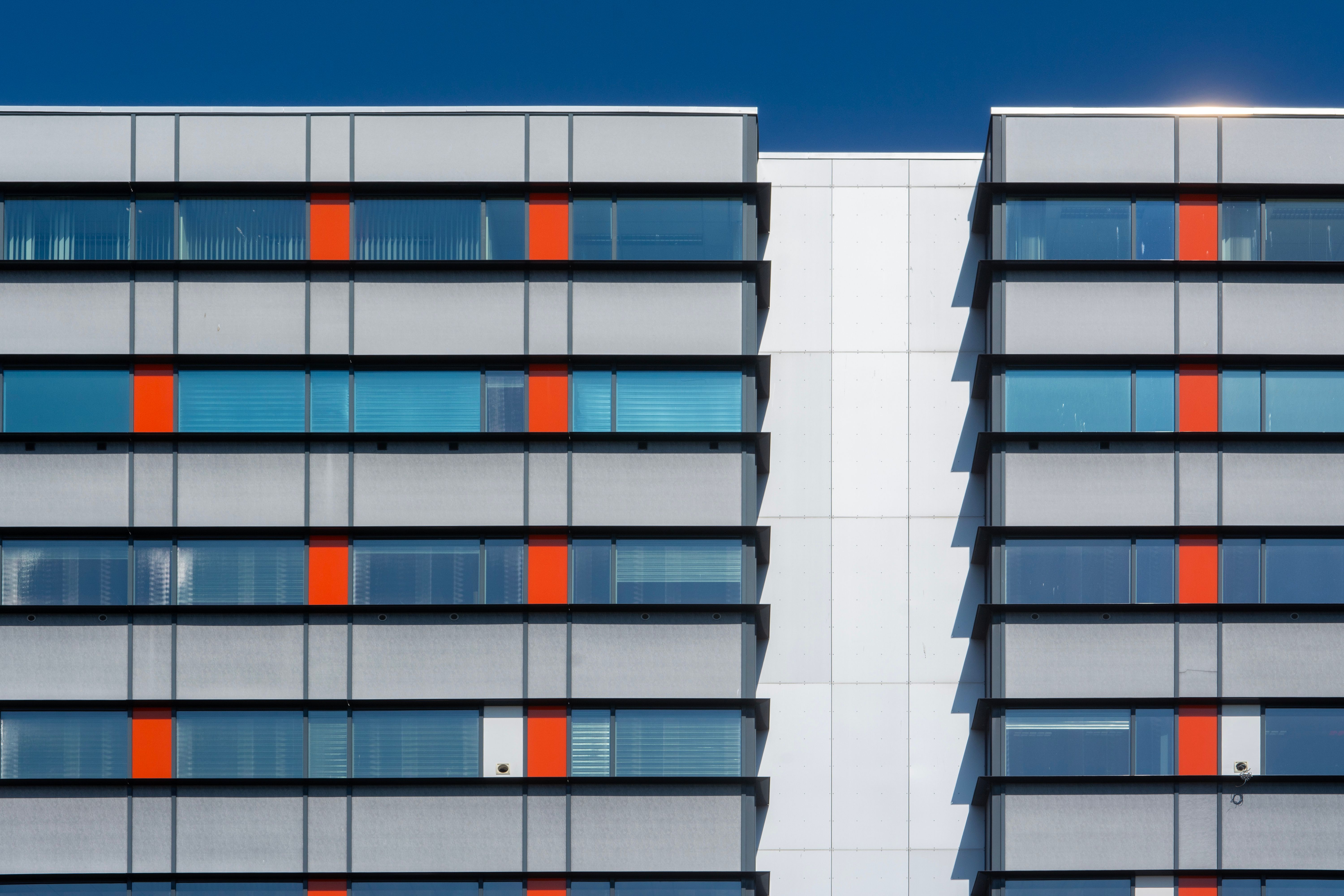 Haus Dosan pale-stone concept building exterior facade
