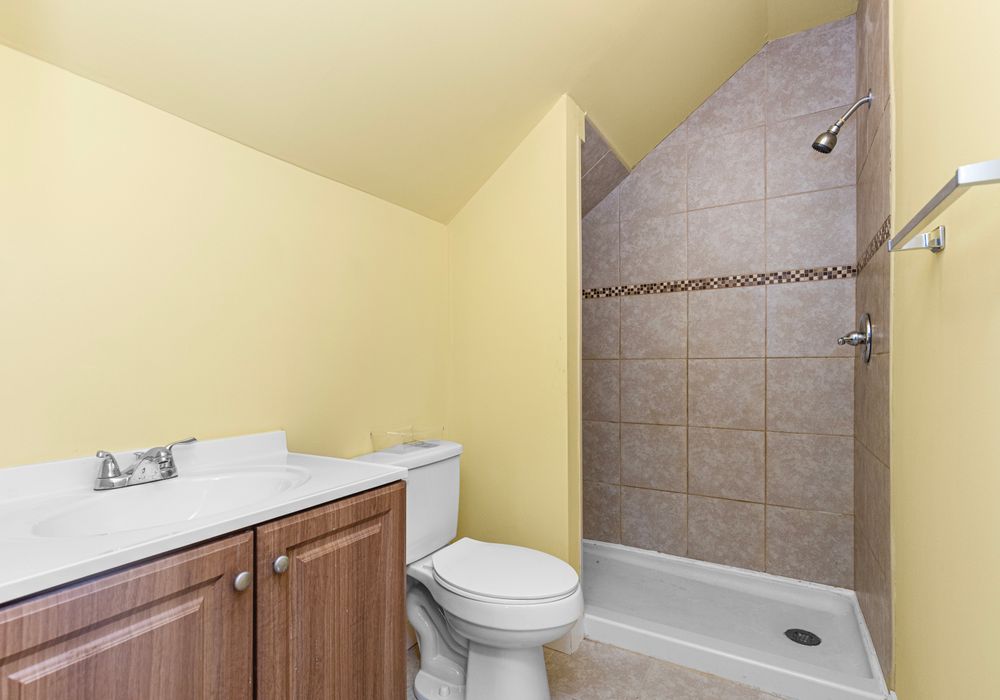Large format porcelain tile bathroom flooring in Brea