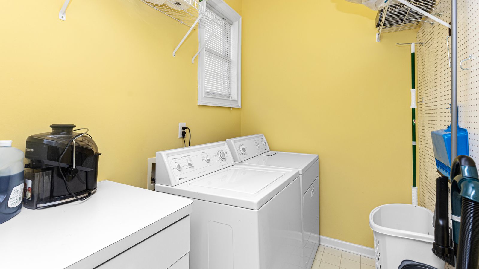 A bright laundry room — most replacements happen where the old unit already sits