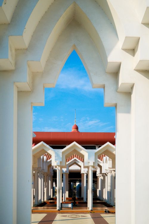 Free Explore the striking design of an Islamic mosque in Jakarta, Indonesia against a vivid blue sky. Stock Photo